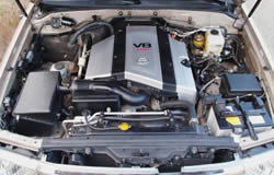 4.7-liter, 8-cylinder, 32-valve V-type DOHC, EFI, cast iron block with aluminum alloy
